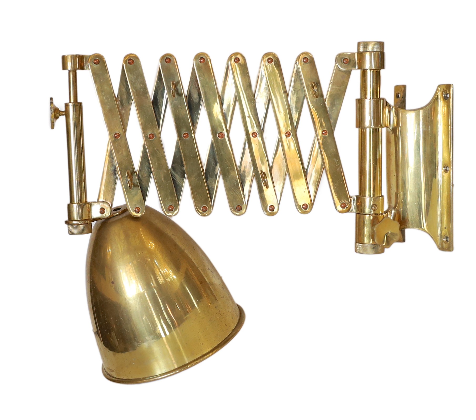 An early 20th century style black and brass expanding wall light, height 34cm